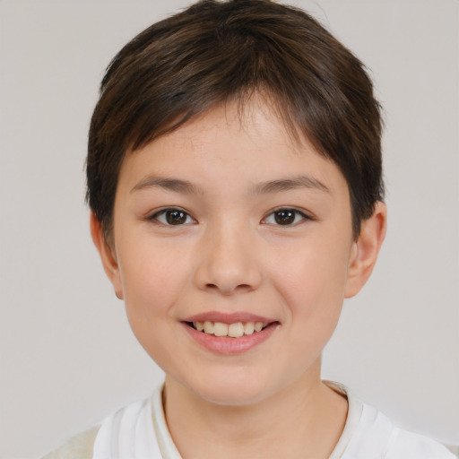 Joyful white child female with short  brown hair and brown eyes