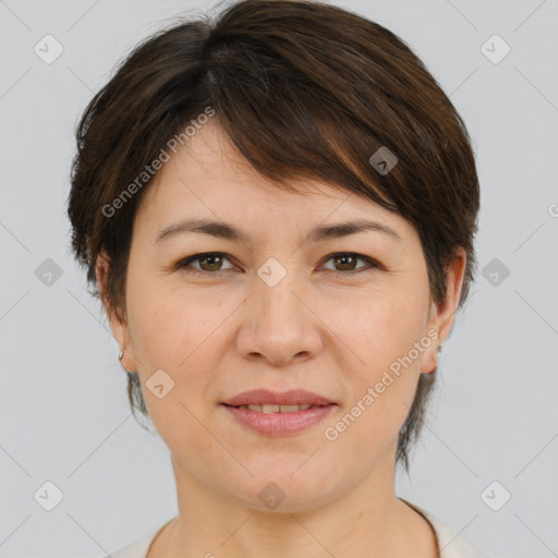 Joyful white adult female with medium  brown hair and brown eyes