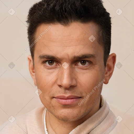 Joyful white adult male with short  brown hair and brown eyes