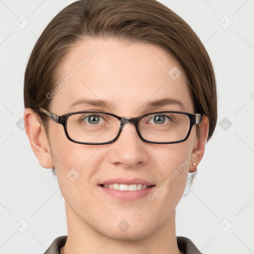 Joyful white young-adult female with short  brown hair and grey eyes