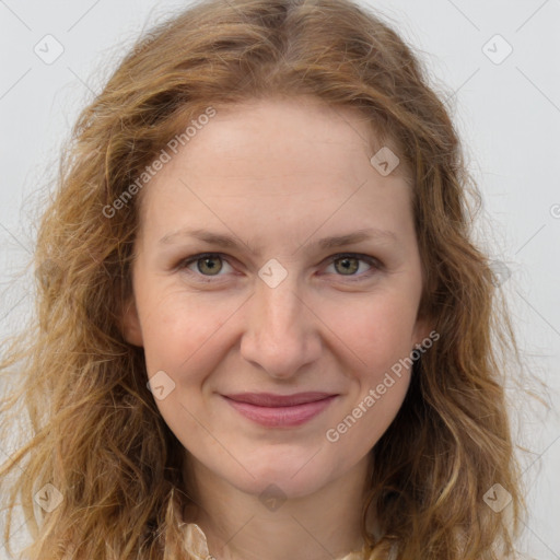 Joyful white young-adult female with long  brown hair and green eyes