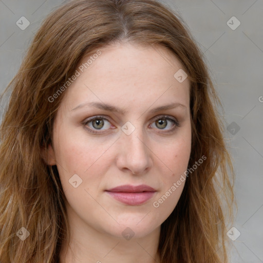 Joyful white young-adult female with long  brown hair and green eyes