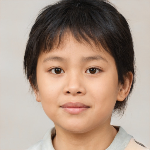 Joyful white child female with medium  brown hair and brown eyes