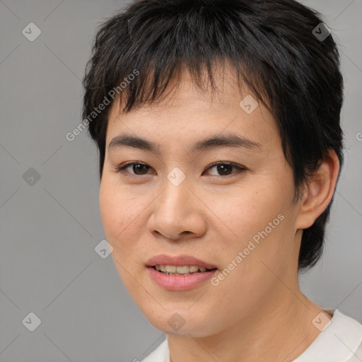 Joyful asian young-adult female with short  brown hair and brown eyes