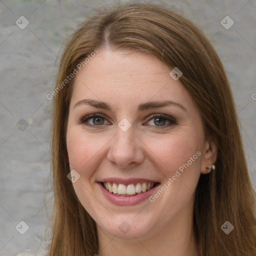 Joyful white young-adult female with long  brown hair and green eyes