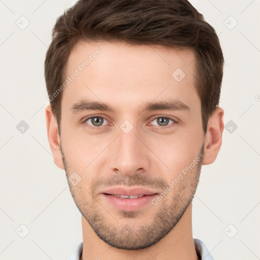 Joyful white young-adult male with short  brown hair and brown eyes