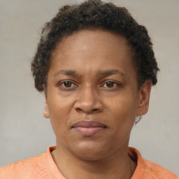 Neutral black adult female with short  brown hair and brown eyes