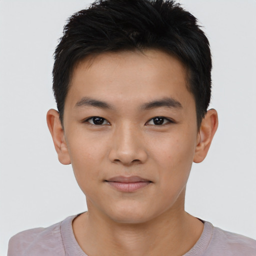 Joyful latino young-adult male with short  brown hair and brown eyes
