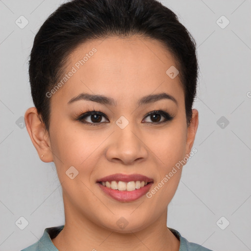 Joyful latino young-adult female with short  brown hair and brown eyes