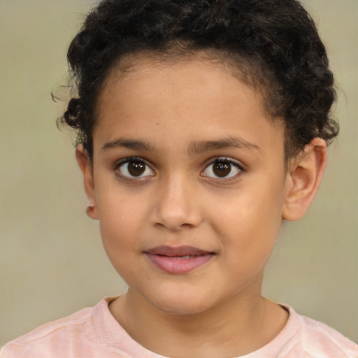 Joyful latino child female with short  brown hair and brown eyes