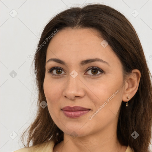 Joyful white young-adult female with long  brown hair and brown eyes