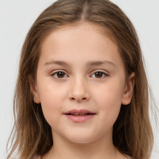 Joyful white child female with long  brown hair and brown eyes