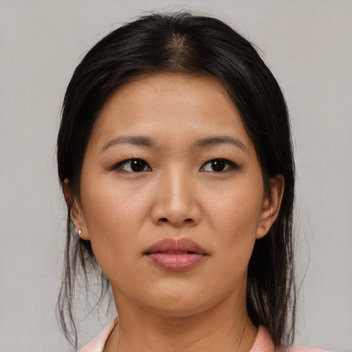 Neutral asian young-adult female with medium  brown hair and brown eyes