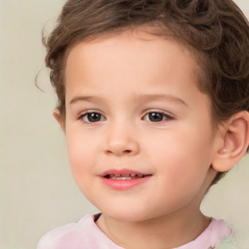 Joyful white child female with short  brown hair and brown eyes