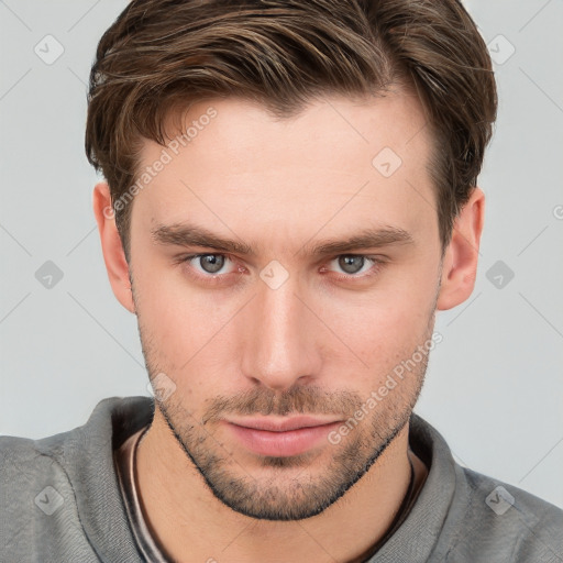 Neutral white young-adult male with short  brown hair and grey eyes