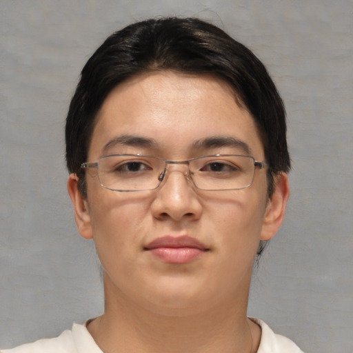 Joyful white young-adult female with short  black hair and brown eyes