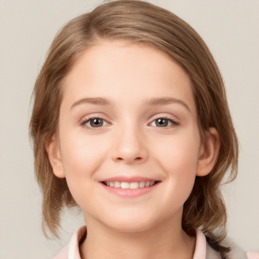 Joyful white child female with medium  brown hair and brown eyes