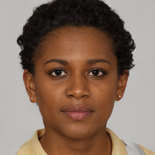 Neutral black young-adult female with short  brown hair and brown eyes