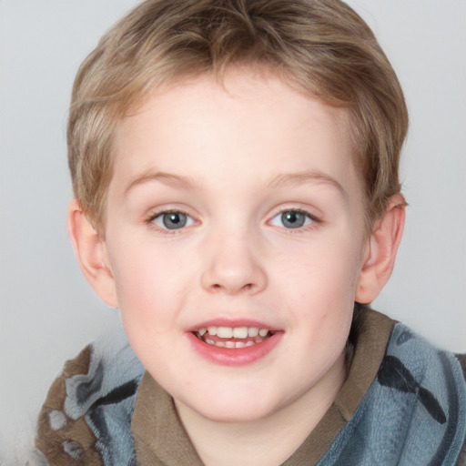 Joyful white child female with short  brown hair and blue eyes