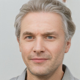 Neutral white adult male with short  brown hair and grey eyes