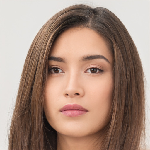 Neutral asian young-adult female with long  brown hair and brown eyes