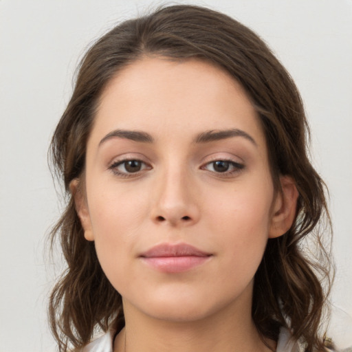 Neutral white young-adult female with medium  brown hair and brown eyes