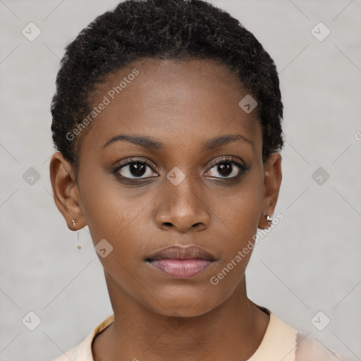 Neutral black young-adult female with short  brown hair and brown eyes