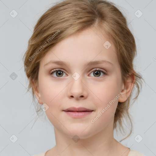 Joyful white child female with medium  brown hair and grey eyes