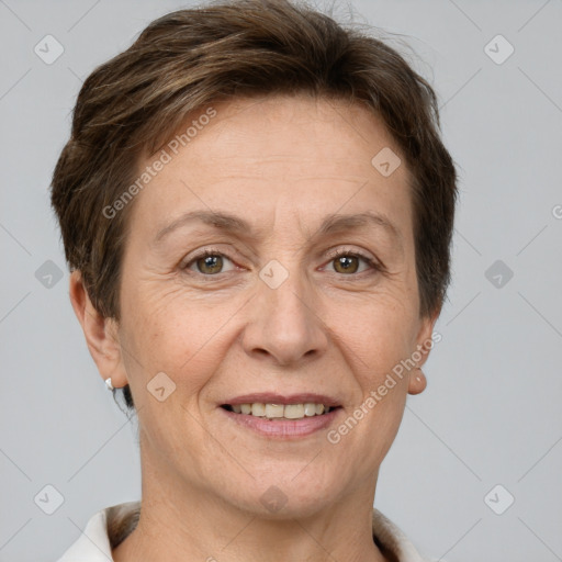 Joyful white adult female with short  brown hair and grey eyes