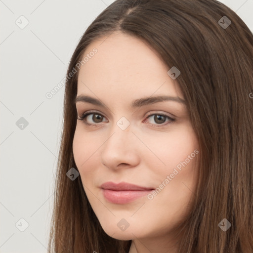 Neutral white young-adult female with long  brown hair and brown eyes