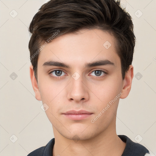 Neutral white young-adult male with short  brown hair and brown eyes