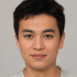 Neutral asian young-adult male with short  black hair and brown eyes