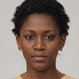 Neutral black young-adult female with short  brown hair and brown eyes