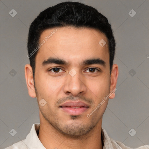 Joyful white young-adult male with short  black hair and brown eyes