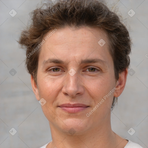 Joyful white adult female with short  brown hair and brown eyes