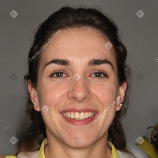 Joyful white adult female with medium  brown hair and brown eyes