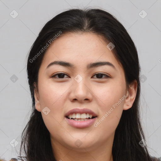 Joyful asian young-adult female with long  brown hair and brown eyes