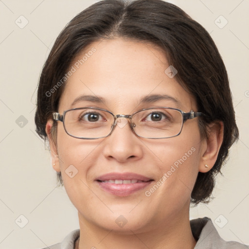 Joyful white adult female with medium  brown hair and brown eyes