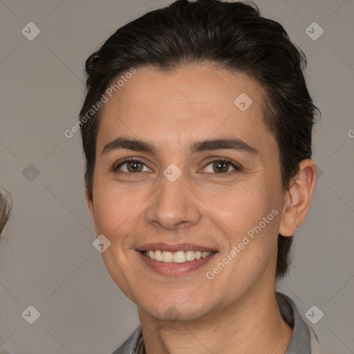 Joyful white adult female with medium  brown hair and brown eyes