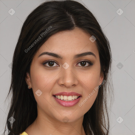 Joyful latino young-adult female with long  brown hair and brown eyes