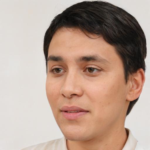 Neutral white young-adult male with short  black hair and brown eyes