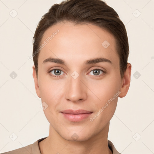 Joyful white young-adult female with short  brown hair and brown eyes