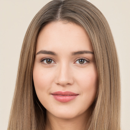 Neutral white young-adult female with long  brown hair and brown eyes