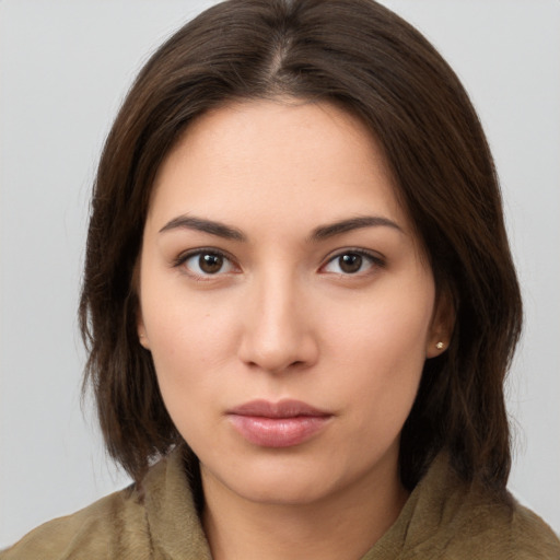 Neutral white young-adult female with medium  brown hair and brown eyes