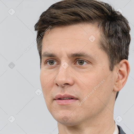 Neutral white adult male with short  brown hair and brown eyes