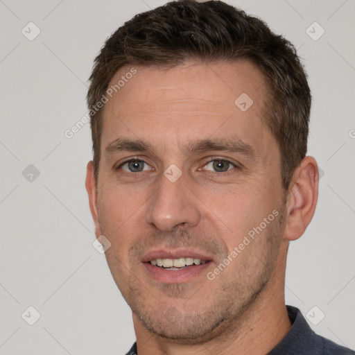 Joyful white young-adult male with short  brown hair and brown eyes