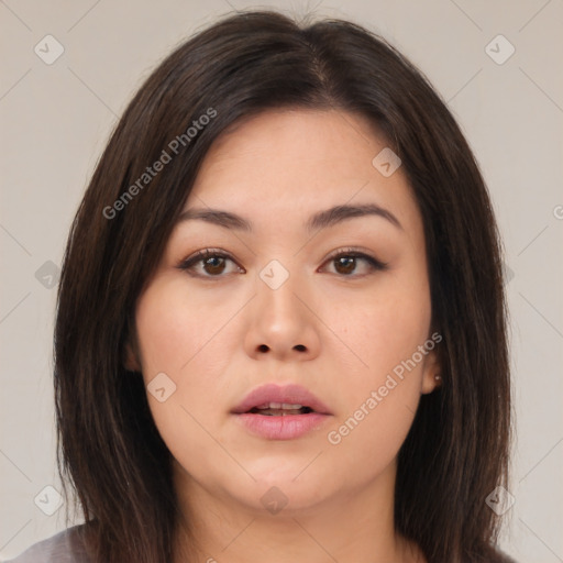 Neutral asian young-adult female with medium  brown hair and brown eyes