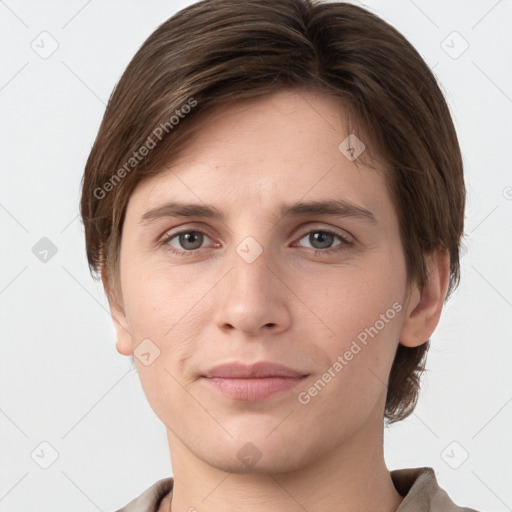 Joyful white young-adult female with short  brown hair and grey eyes