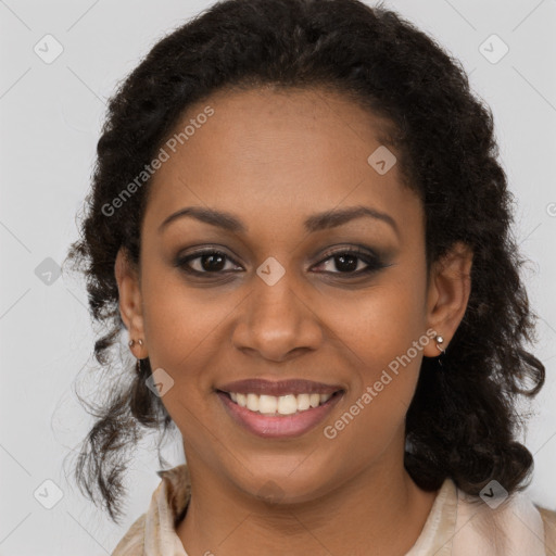 Joyful black young-adult female with long  brown hair and brown eyes