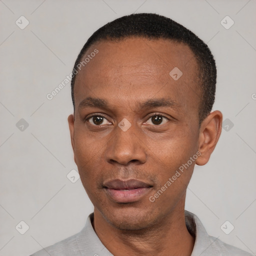 Neutral latino adult male with short  black hair and brown eyes